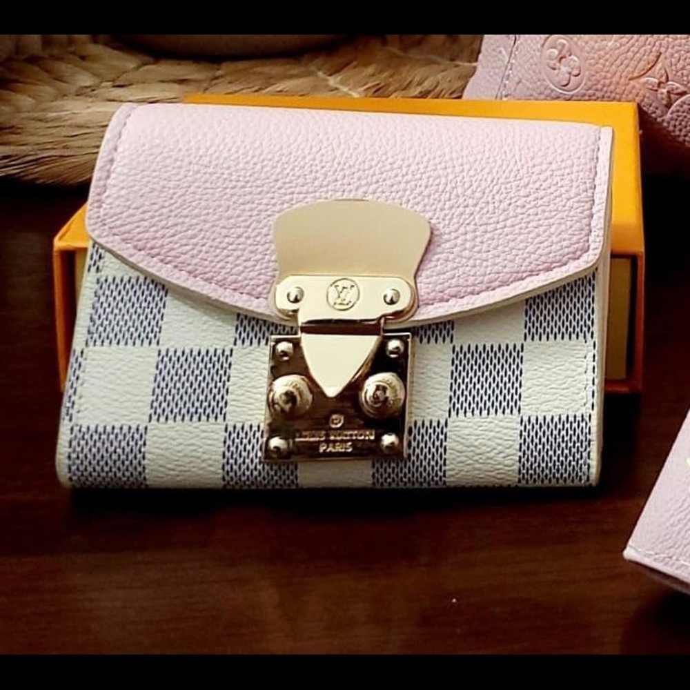 White checkered and pink leather wallet